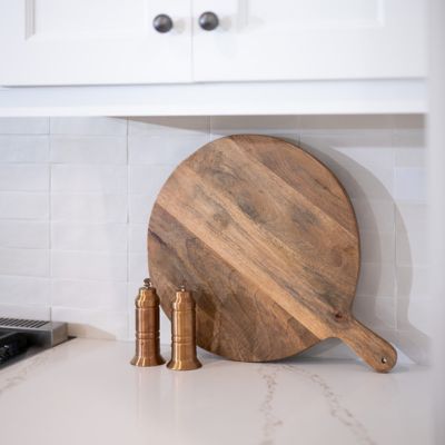 white kitchen countertop and backsplash design with wood pizza peel in Santee CA